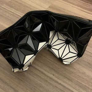 New pouch bag black white two tone. Foldable, issey miyake bao bao style